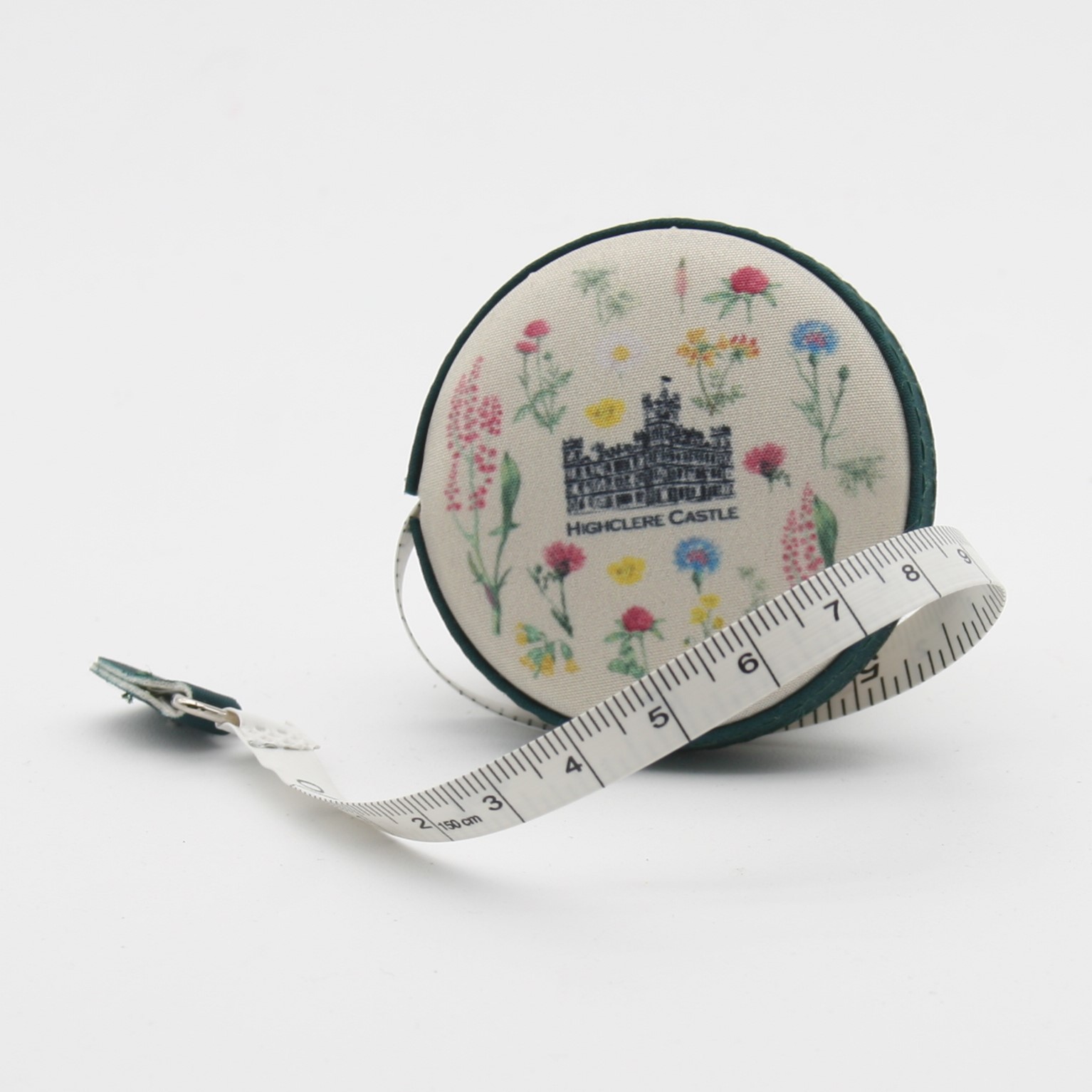 Fabric bound retractable tape measure